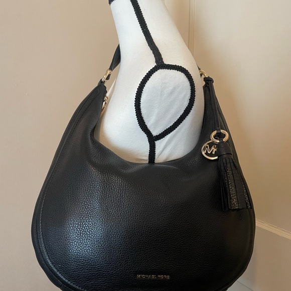 Michael Kors pebbled black leather slouch purse with fringe and emblem detail - Picture 3 of 6